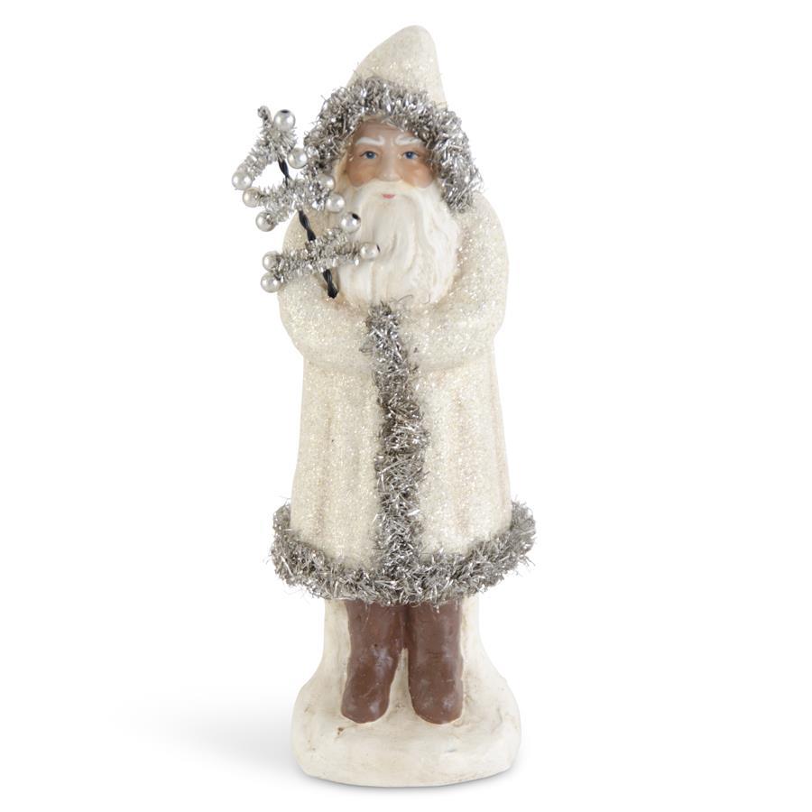 Twelve-inch cream glittered Santa figure trimmed in silver tinsel with pulp construction.