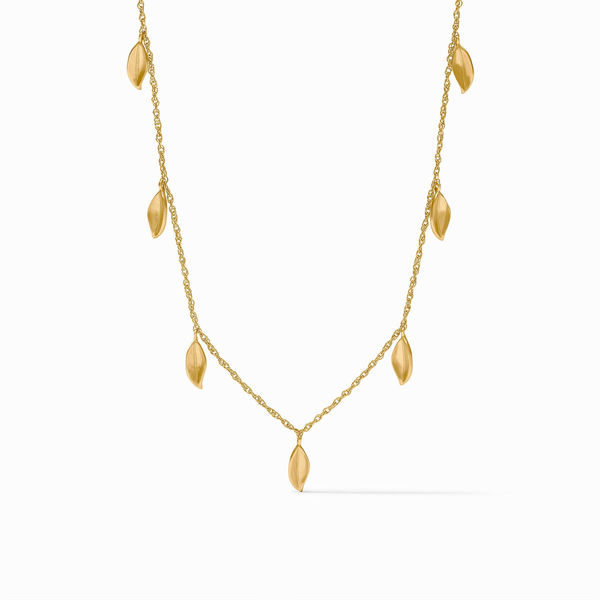 Willow delicate charm necklace with adjustable chain in silver tone featuring a small pendant.