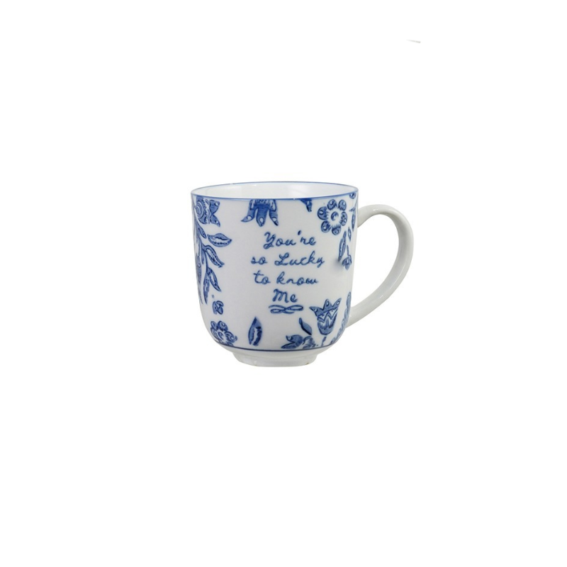 Blue and white stoneware mug with floral designs and the text "You're so Lucky to know Me".