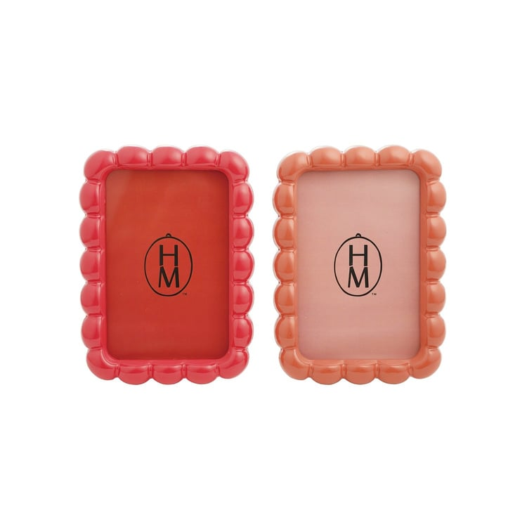 Two 4x6 resin scalloped photo frames in red and peach, sold individually.