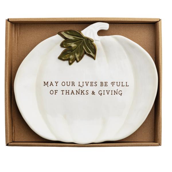 Stoneware pumpkin-shaped plate in orange with a subtle texture.