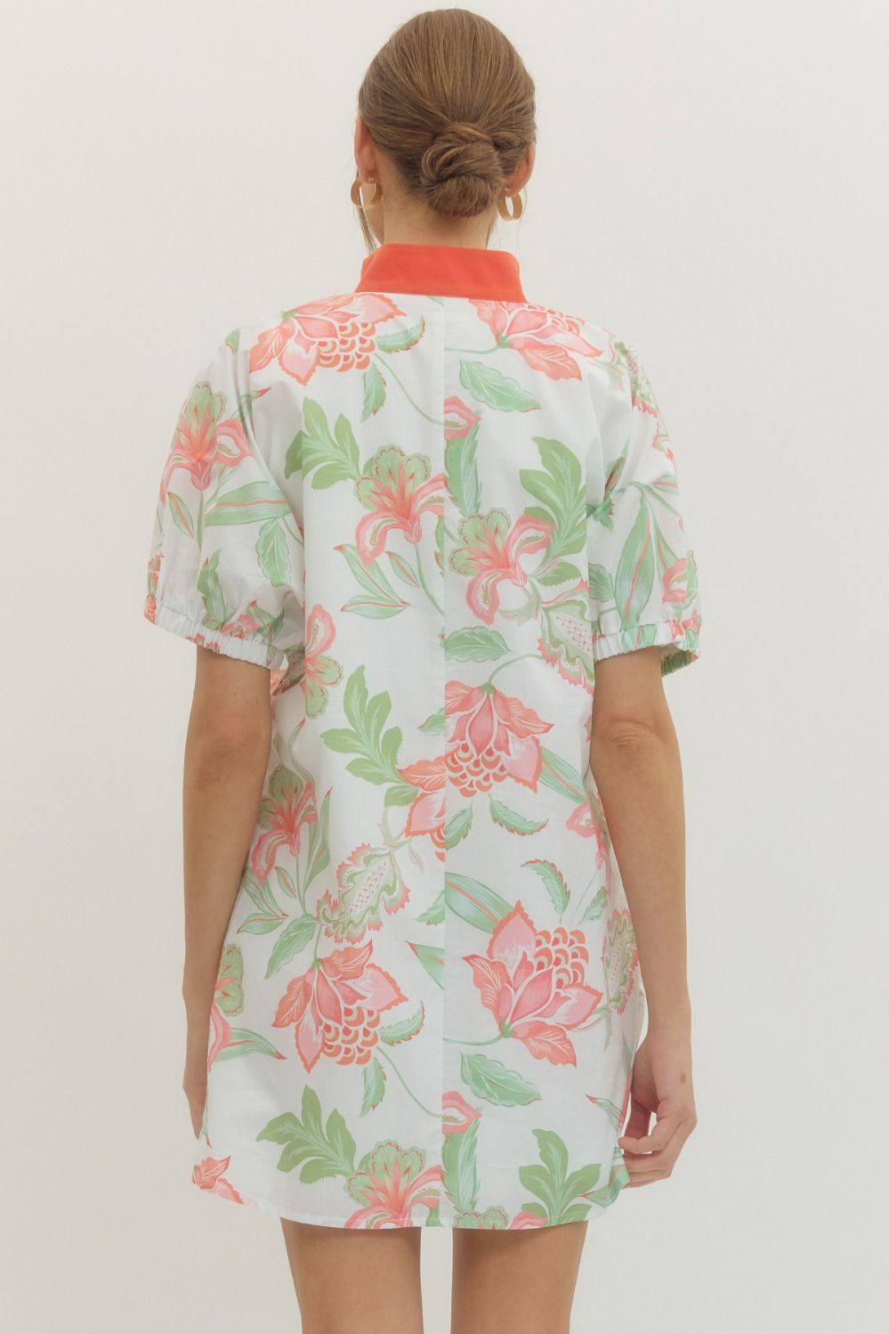 Ella floral print mini dress with puff sleeves, contrast band collar V-neck, side pockets, and lightweight cotton fabric.