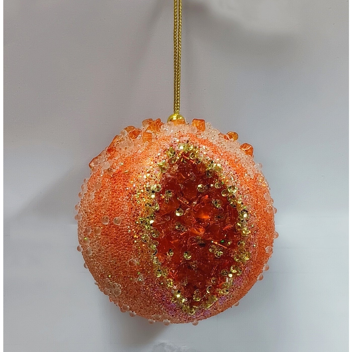 80mm orange textured sphere ornament with glistening beads and a gold hanging cord.