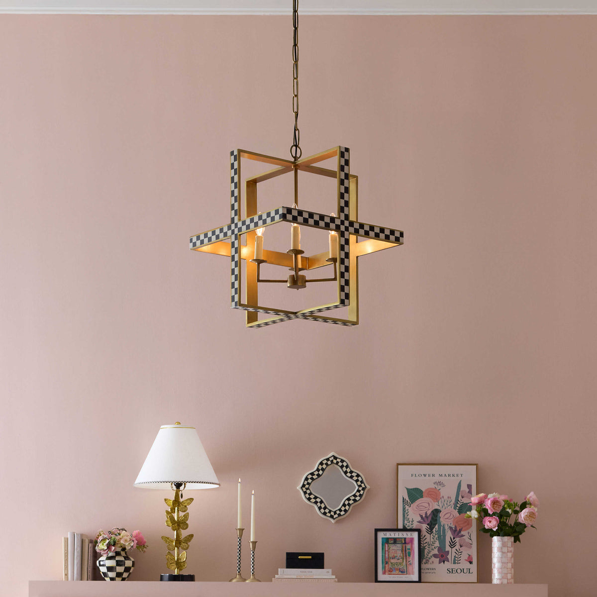 Cube-shaped chandelier with cast aluminum frame featuring alternating black and white resin inlay.