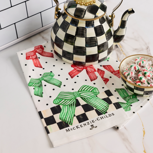 Holiday Bow Printed Dish Towel with red and green bows, polka dots, and a checkered border.