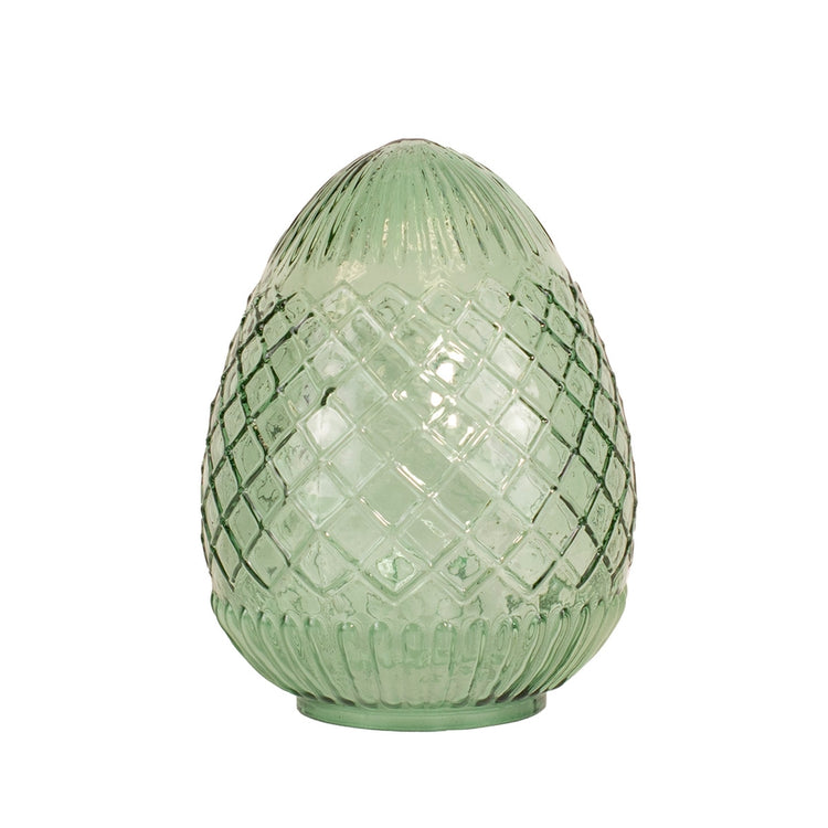 Handcrafted glass egg with vivid hue and intricate surface details.