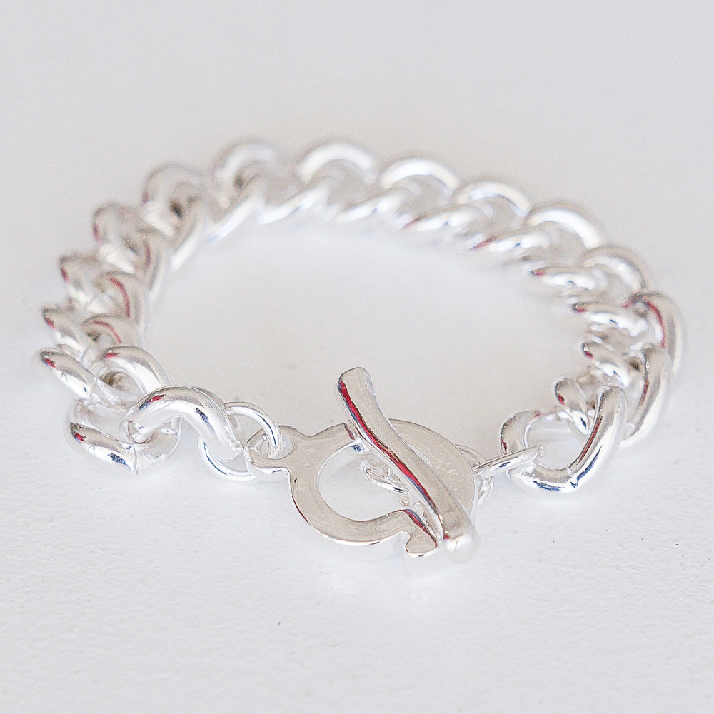 Silver chunky link chain necklace with distressed leather accents