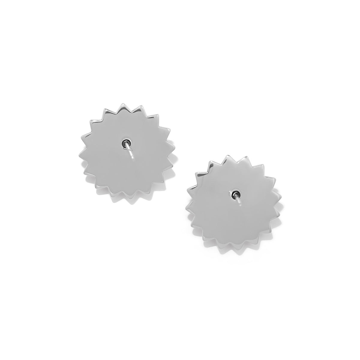 Back view of Mosaic Nova silver-tone post earrings with flat disc backs and starburst shape.