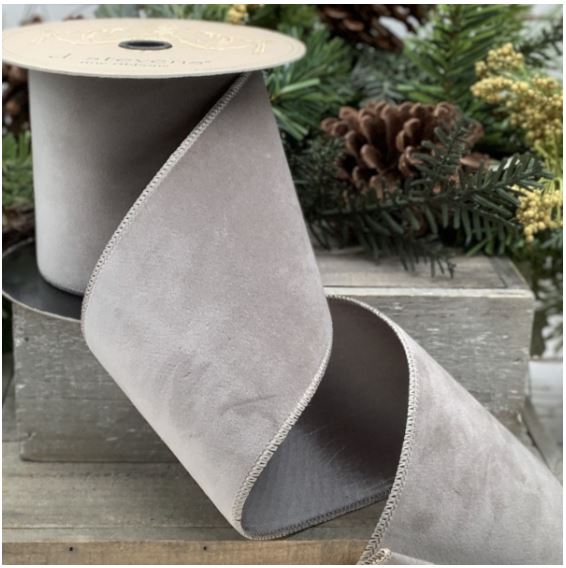 4-inch wide black velvet taffeta ribbon with a smooth finish.