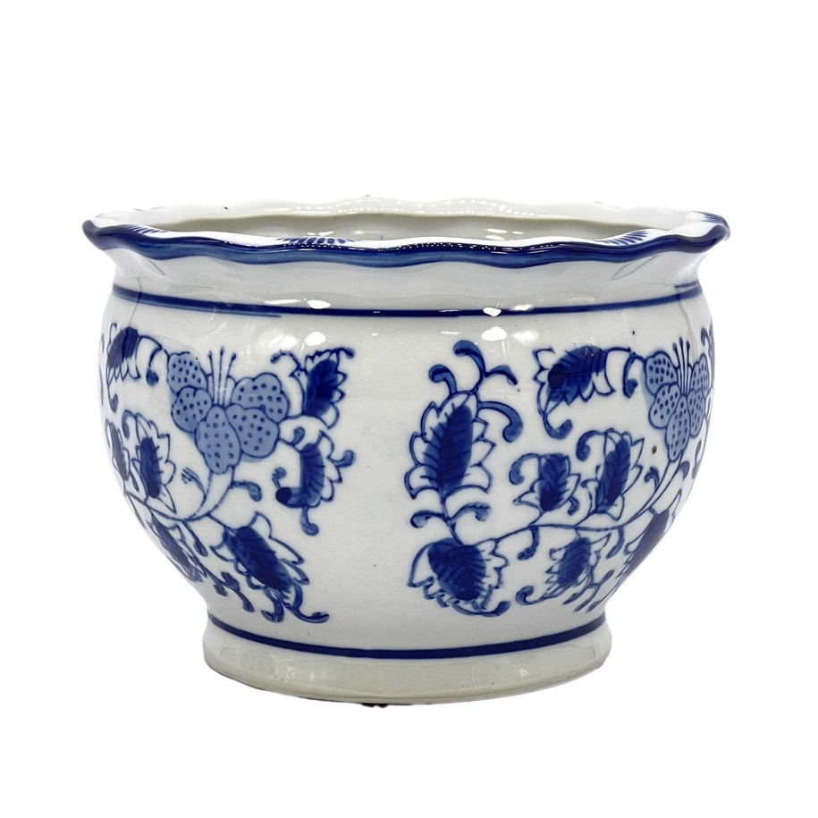 Blue and white floral ceramic pot with ruffled lip rim