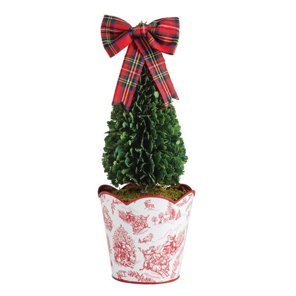 Large faux boxwood topiary with a red tartan bow in a white and red toile scalloped tin pot.