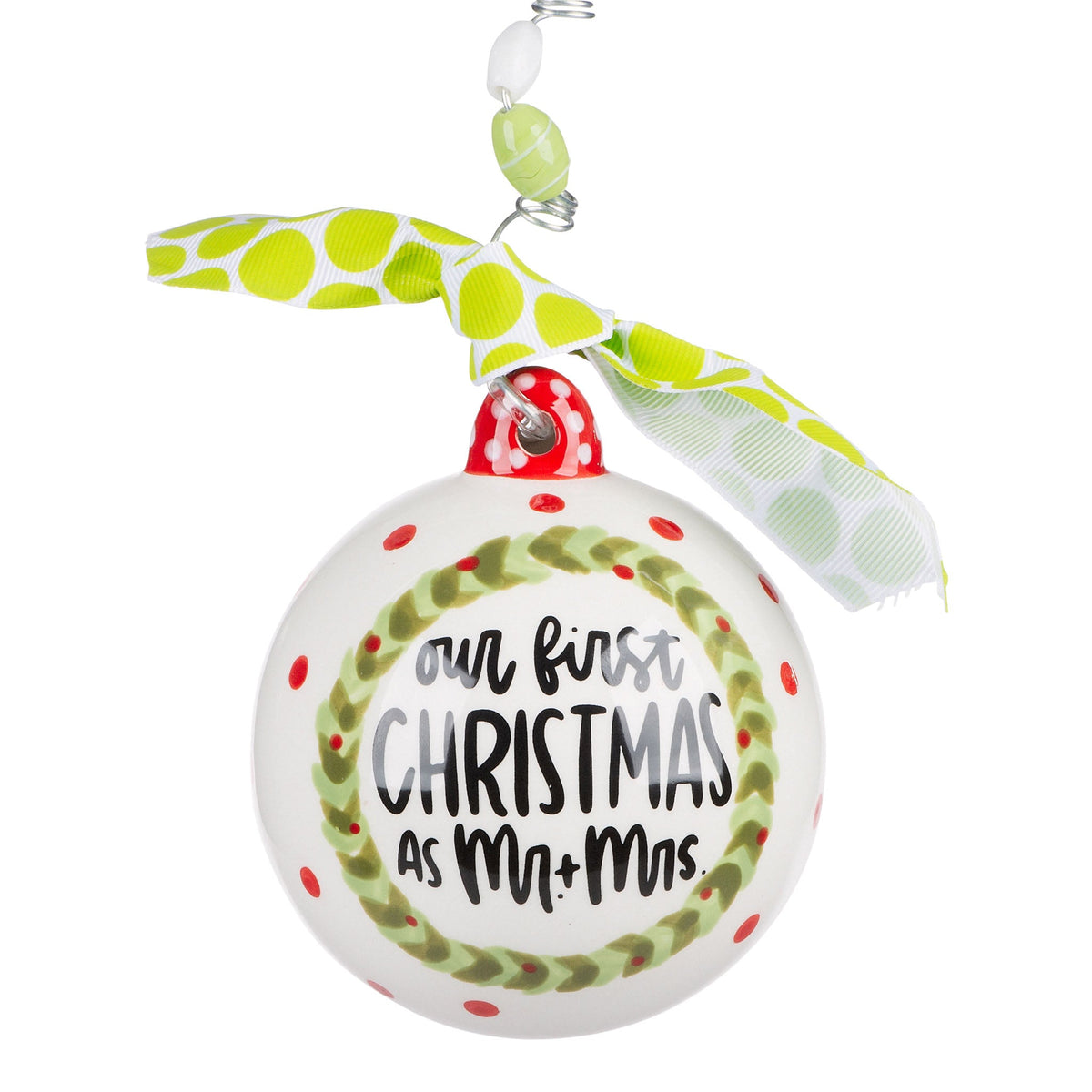 Hand-painted ceramic Christmas ornament shaped as a couple in formal attire with festive red and green accents.