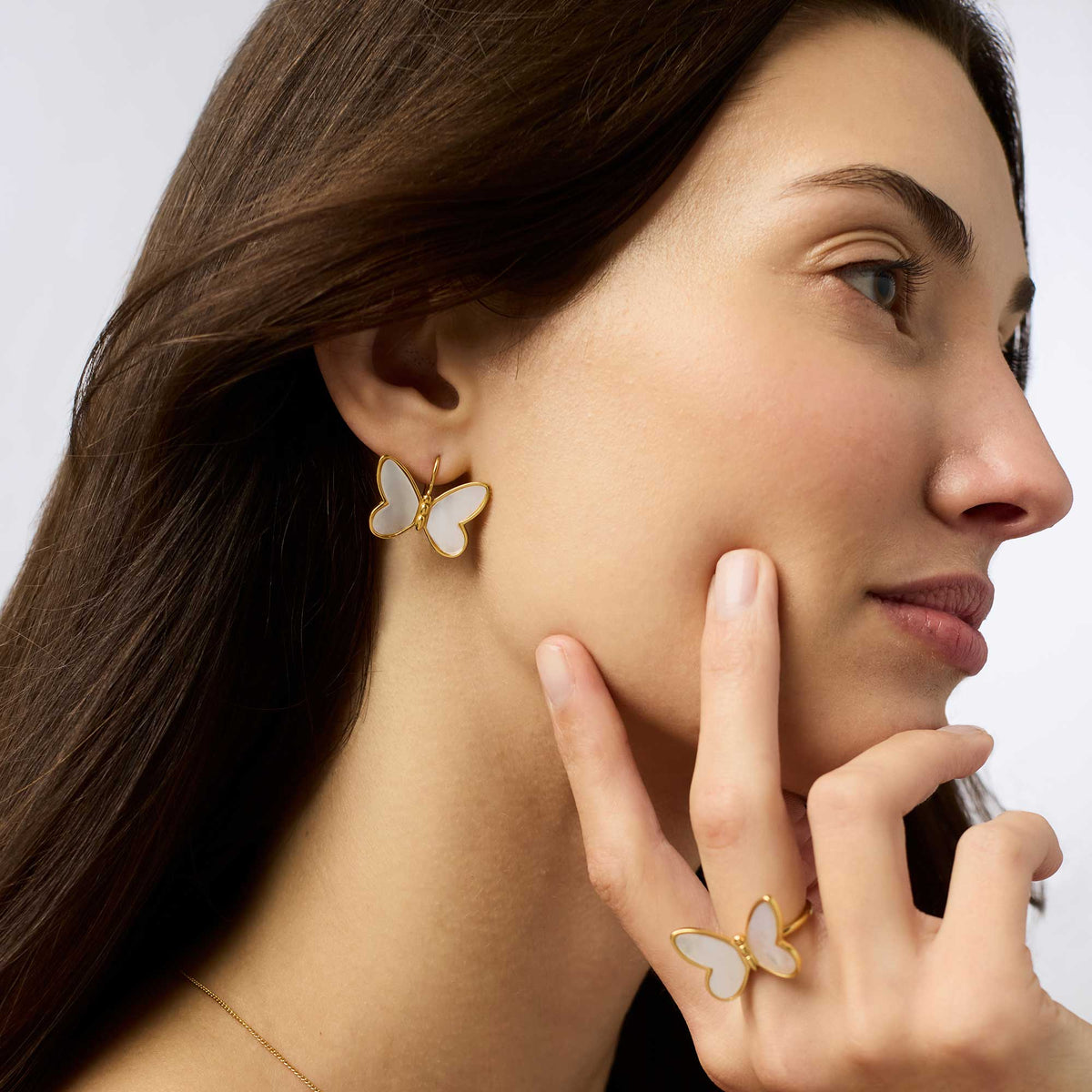 Papillon earring with mother of pearl drop on a French wire hook