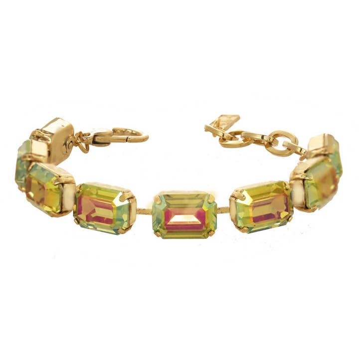 Adjustable watermelon-colored Monique bracelet with a silver-tone clasp.