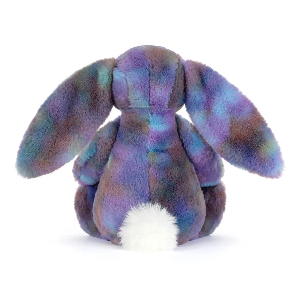 Back view of a Zodihop Luxe Bunny plush with multi-colored purple and blue fur and a white tail.