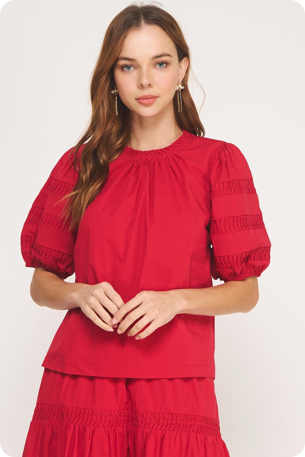 Venice Reverse Pintuck Puff Sleeve Top in light fabric with gathered neckline and puffed sleeves.