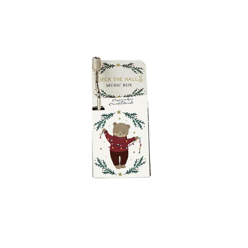 Deck the Halls music box with a hand crank and a bear illustration wearing a sweater.