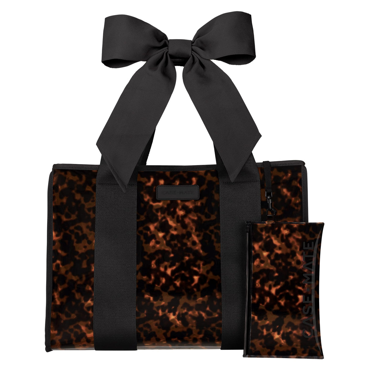 Tortoise shell jelly tote bag with black jacquard straps, a large bow, and matching phone pouch.