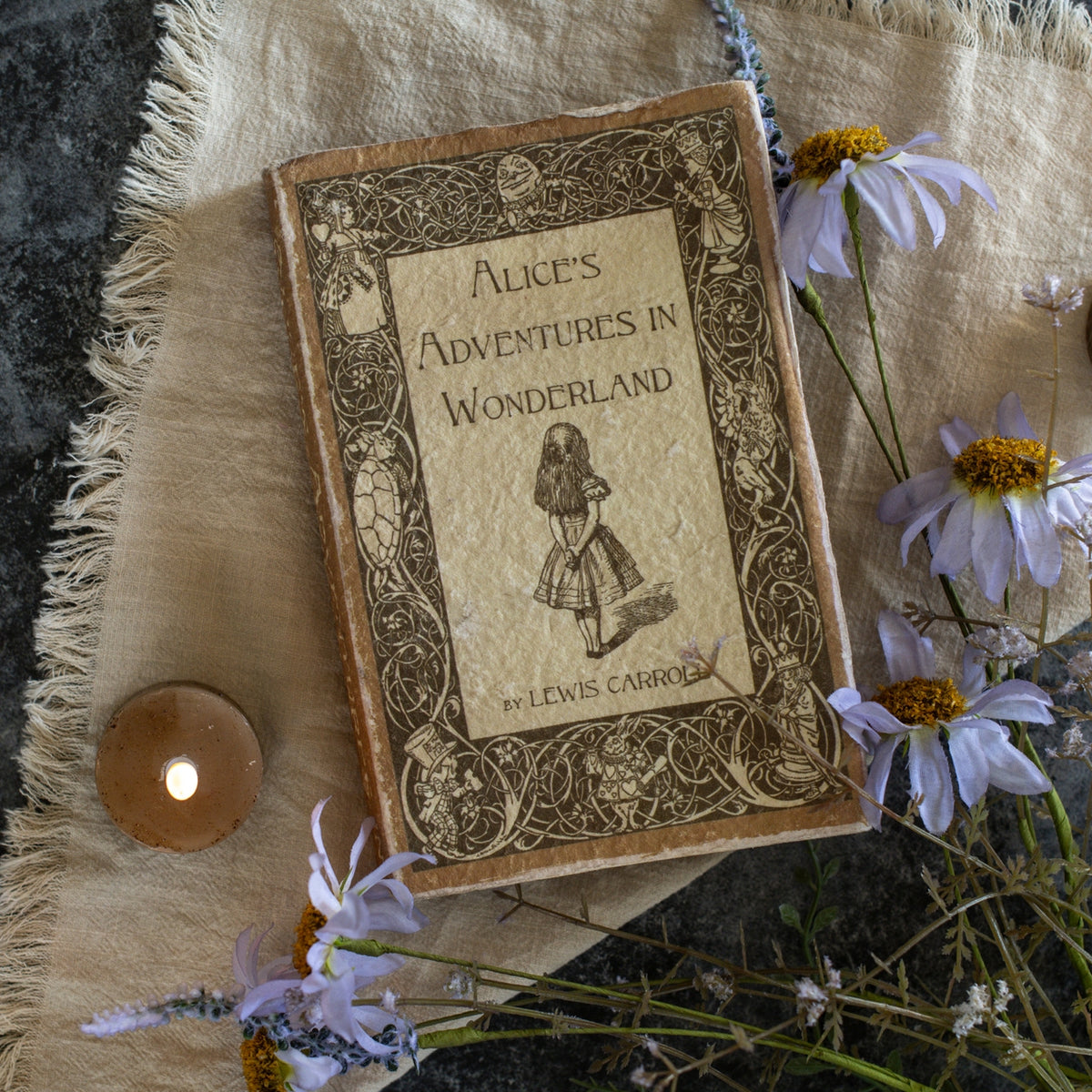 Alice's Adventures in Wonderland journal with whimsical illustration cover