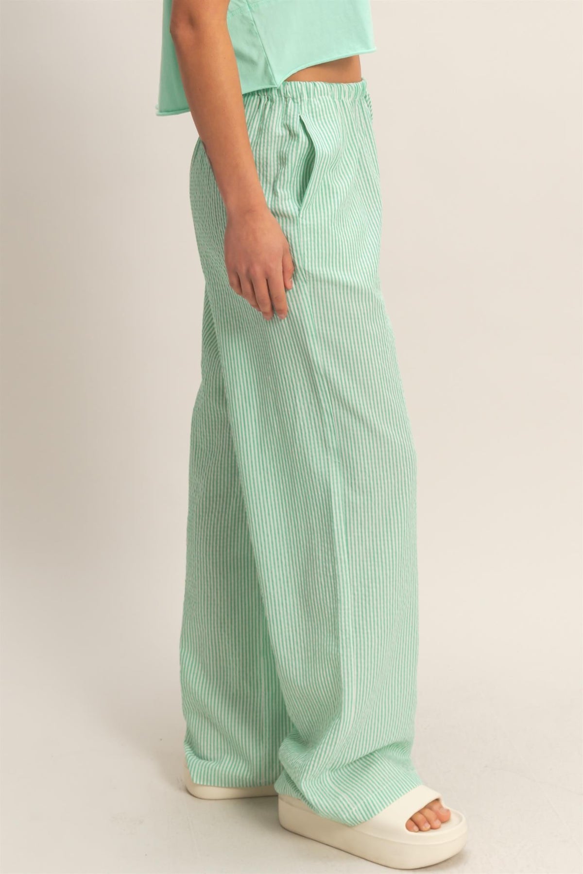 Arianne striped wide leg pants in polyester rayon blend with a relaxed silhouette.