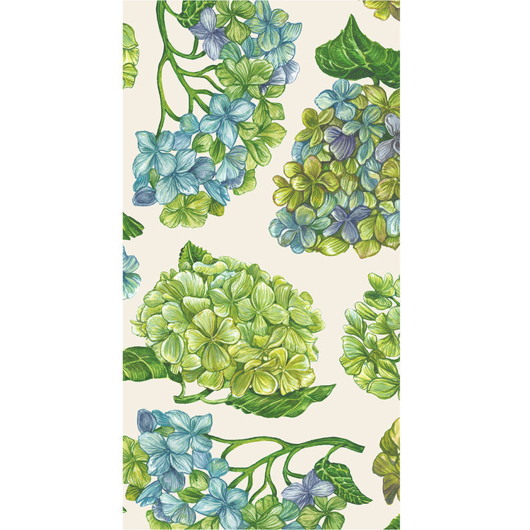 Guest napkin with a botanical pattern of blue and green hydrangea flowers on a cream background.