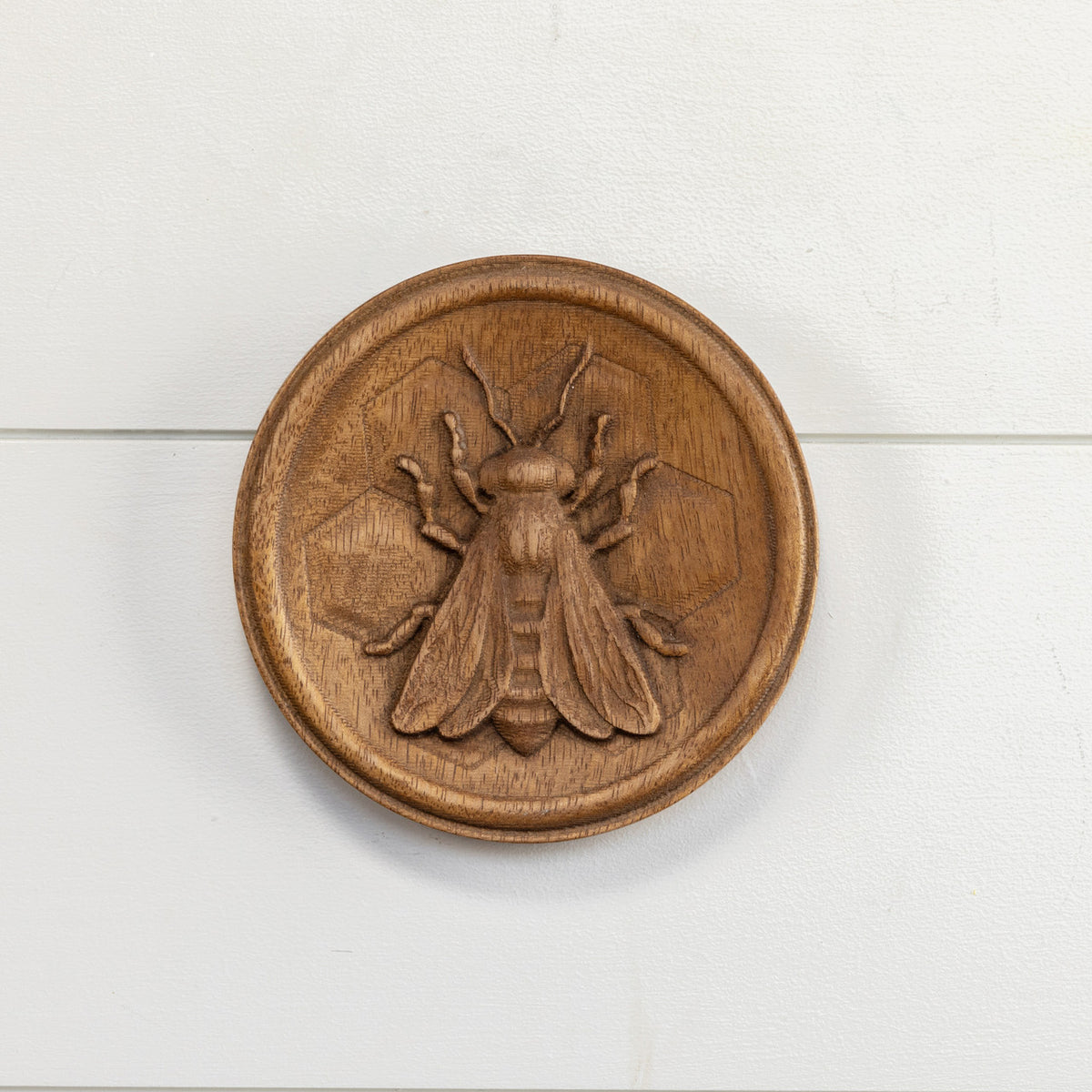 Wood wall plaque with a simple rectangular shape.