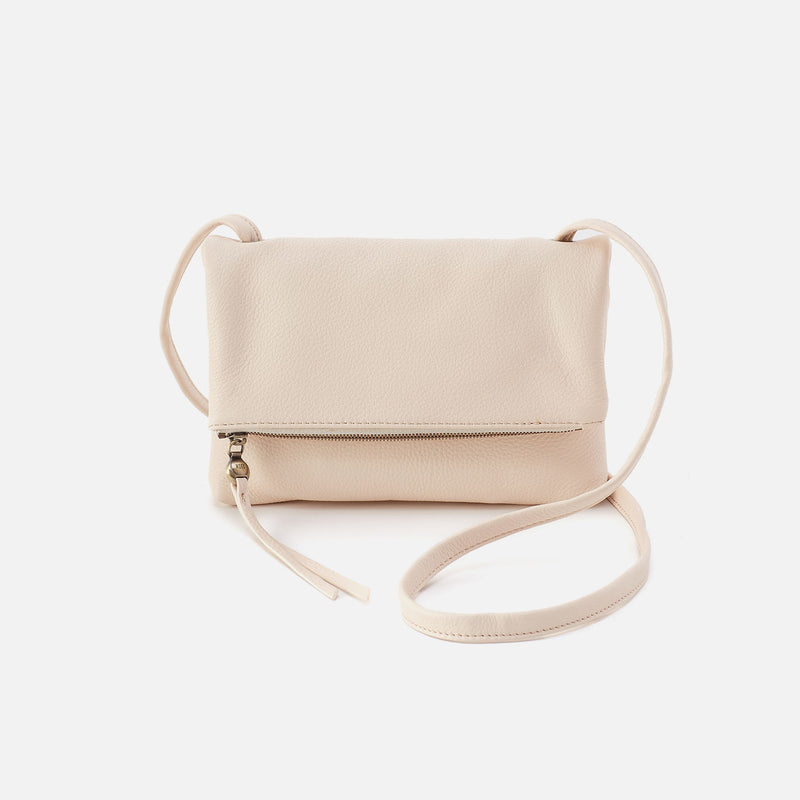 Grant Small Crossbody bag in brushed antique brass hardware with sandlewood lining.