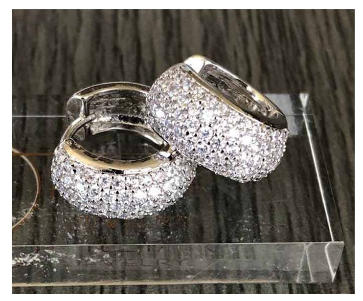 Five Row Medium Huggie Earrings with high-quality cubic zirconia stones on a pierced post.