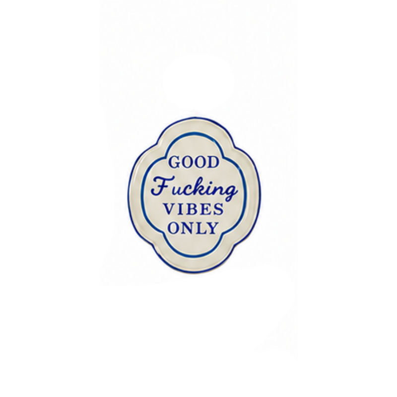 Hand-painted stoneware magnet with blue script reading "GOOD Fucking VIBES ONLY".