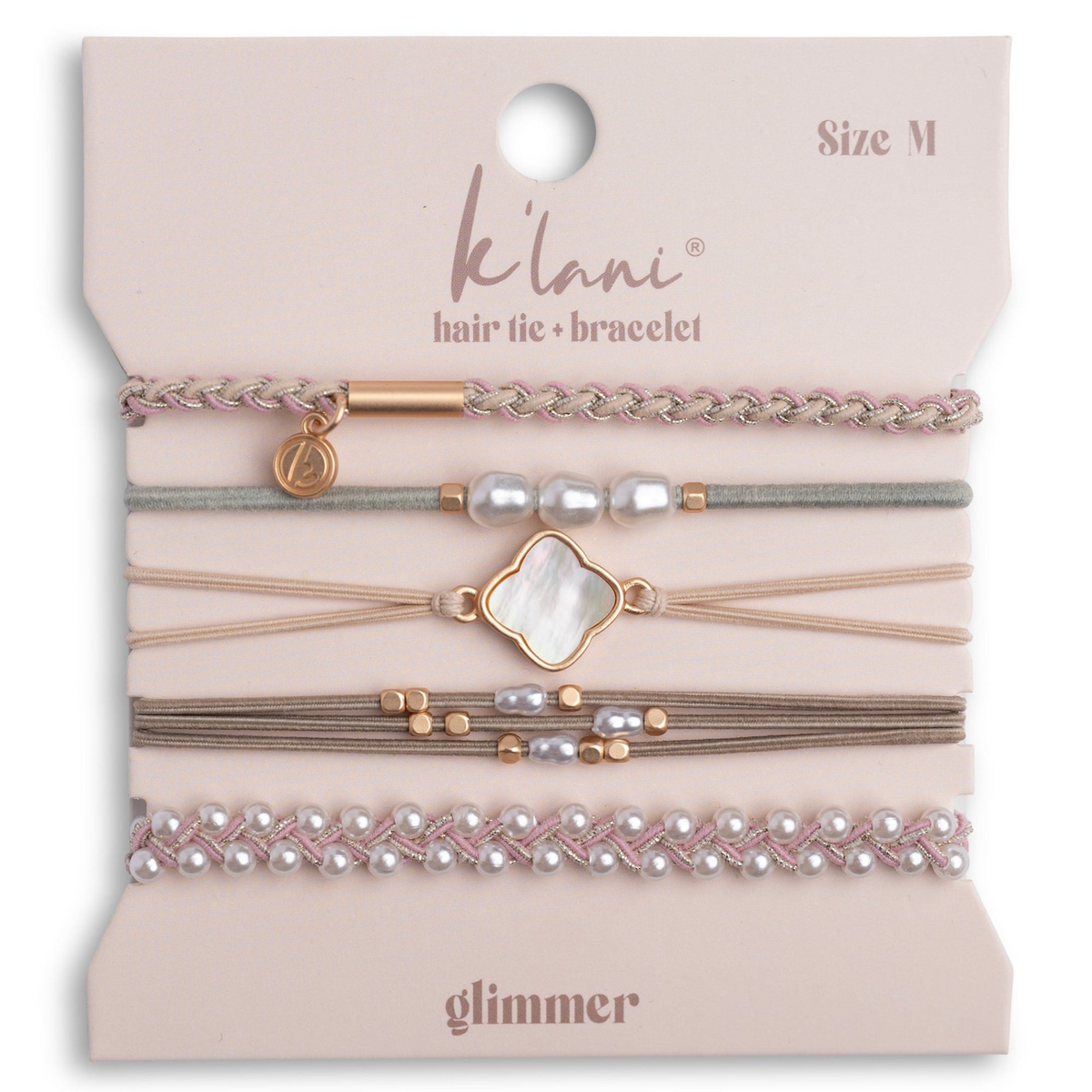 Five Glimmer hair tie bracelets in neutral tones with pearls and gold accents on a display card.