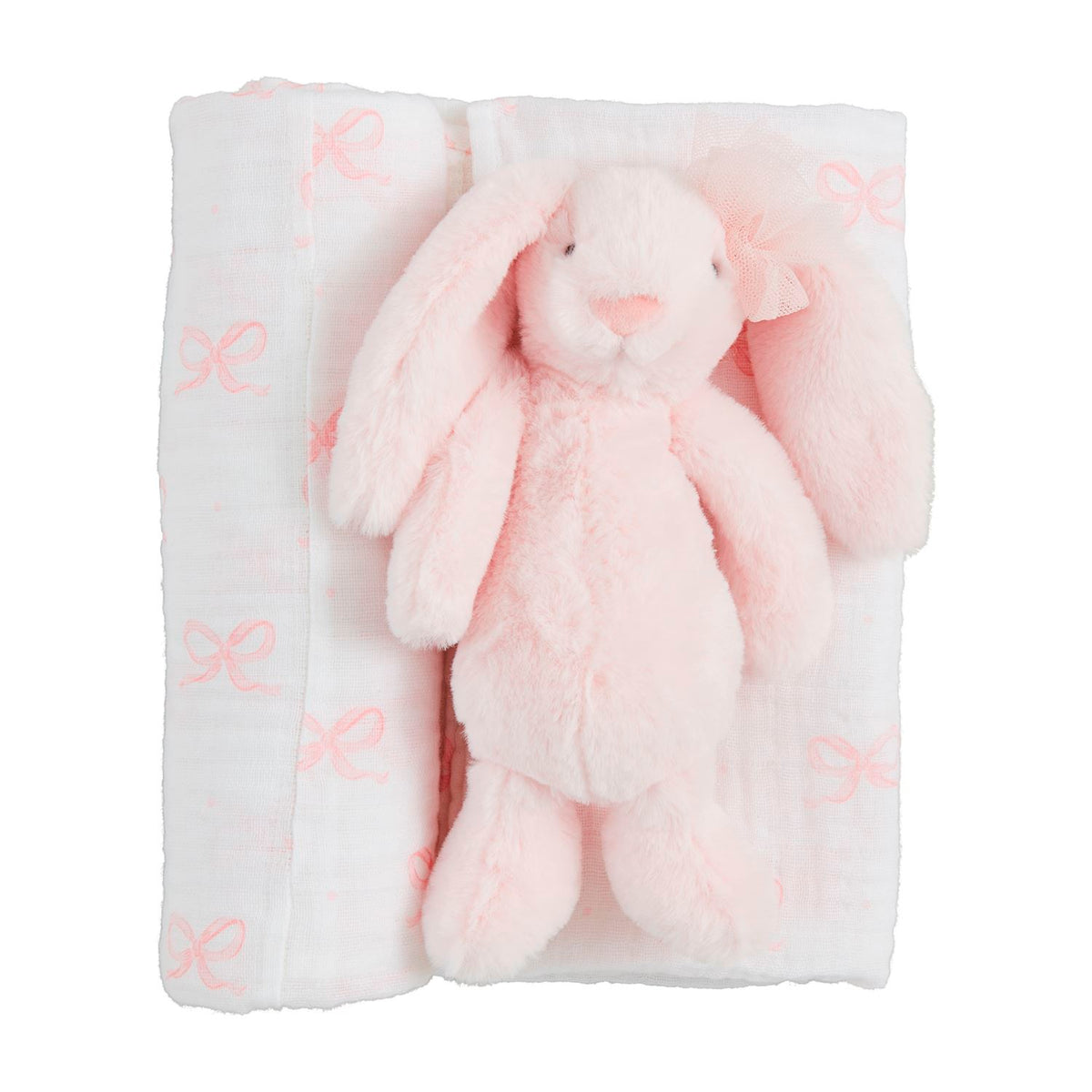 Bow Bunny swaddle in faux fur with cotton lining featuring a bunny rattle attachment.