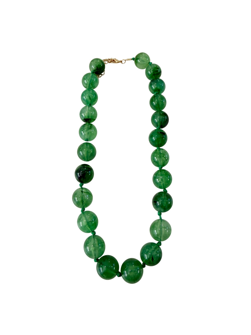 Mabry Chunky Beaded Necklace featuring large, glossy marbled green stone beads with a gold clasp.