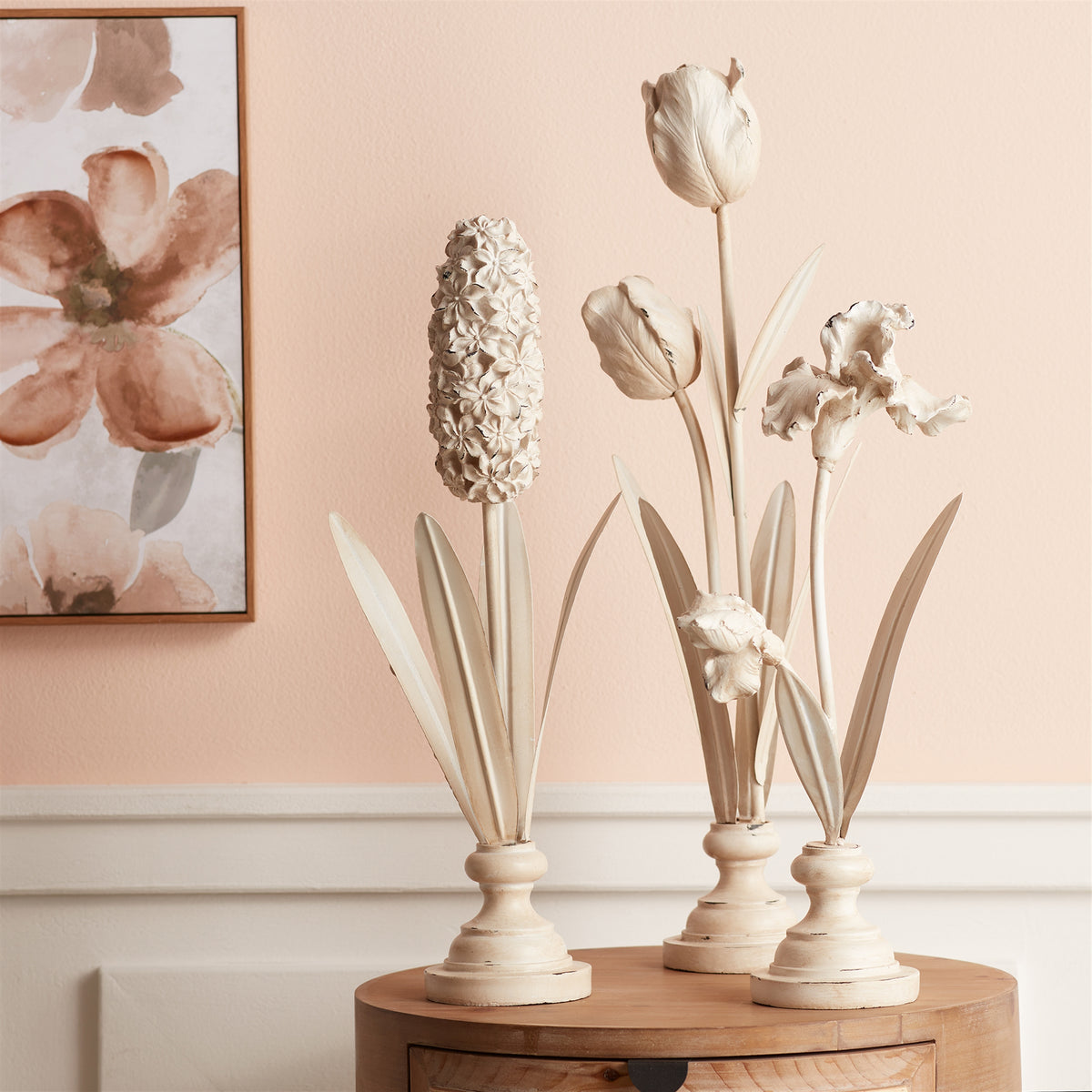 Standing resin flower sculpture in a natural beige tone with an organic petal silhouette.