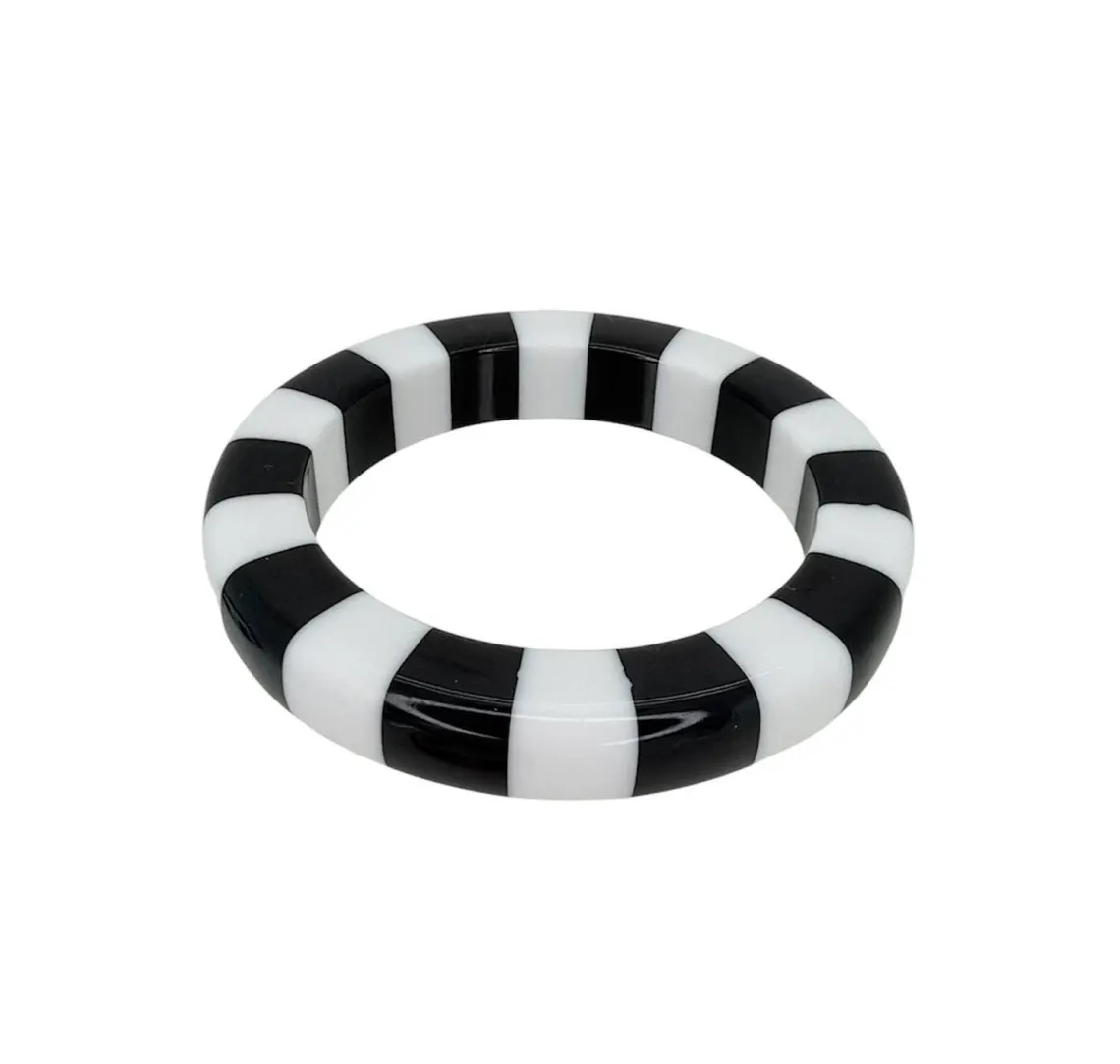 Black and white striped Cabana Cuff Bangle with a smooth, glossy finish.