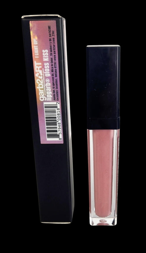 Garb2ART Full Lipgarb Gloss in a clear tube with a dark blue cap, showing a light pink shade.
