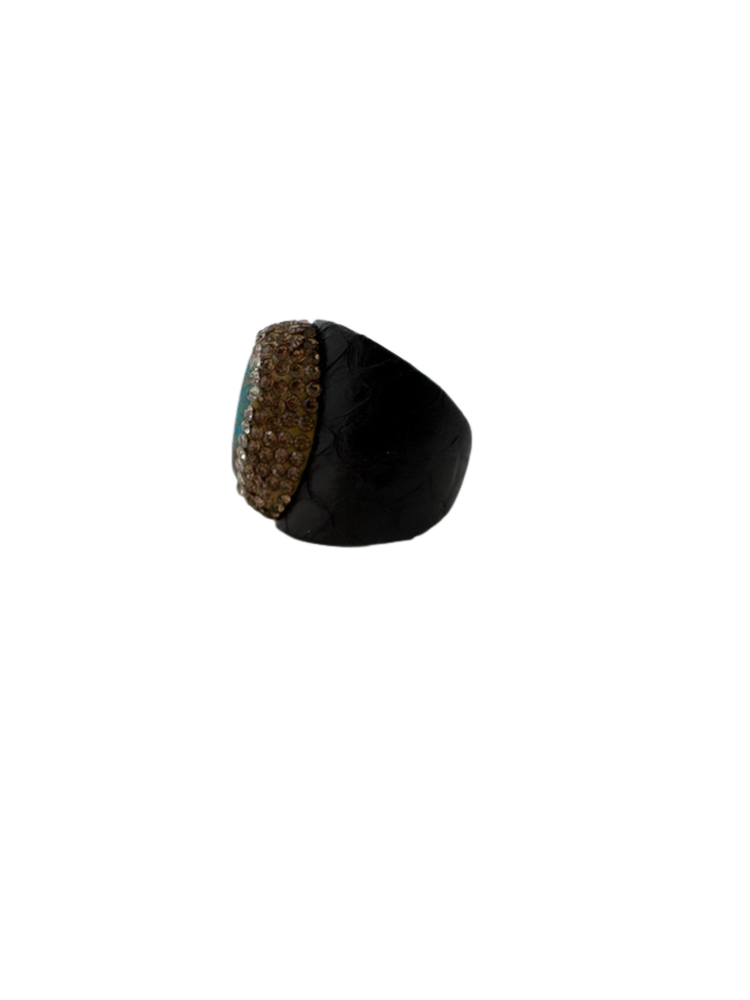 Fashion gemstone ring with a black textured band and a cluster of brown sparkling stones.