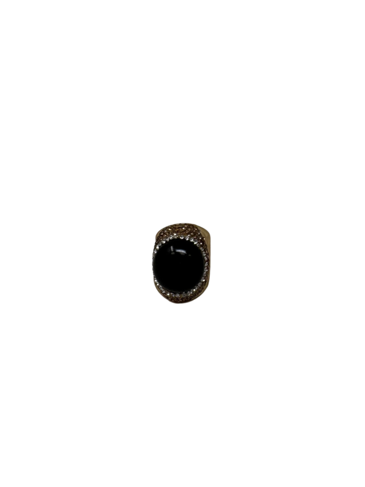 Queen of Sheba Fashion Ring featuring a large black oval stone surrounded by small crystals.