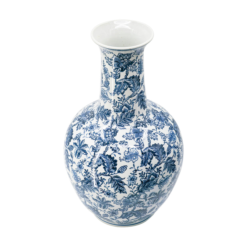 Blue and white porcelain chinoiserie flower vase with intricate floral and leaf patterns.