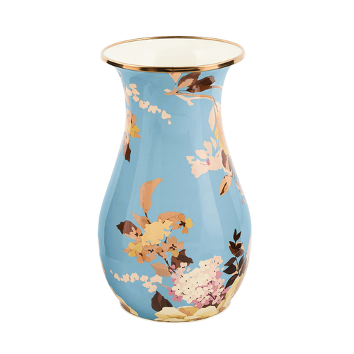 Tall light blue vase with a gold rim and a floral pattern in shades of yellow, pink, and brown.