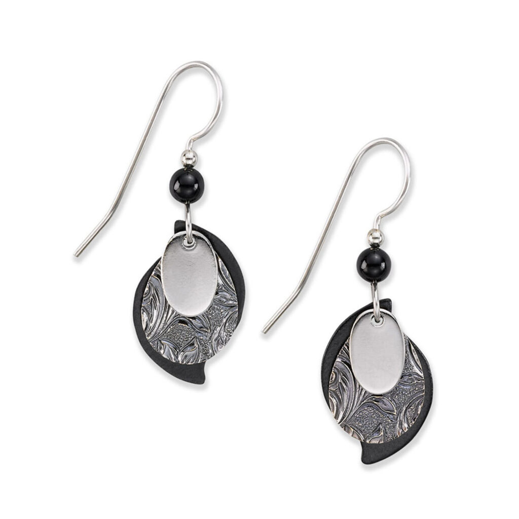 Black three-layer paisley earrings made from raw brass and copper with a handcrafted silhouette.