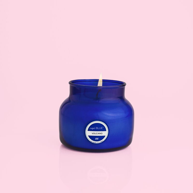 Volcano Signature Petite Jar in black glass with a white lid.