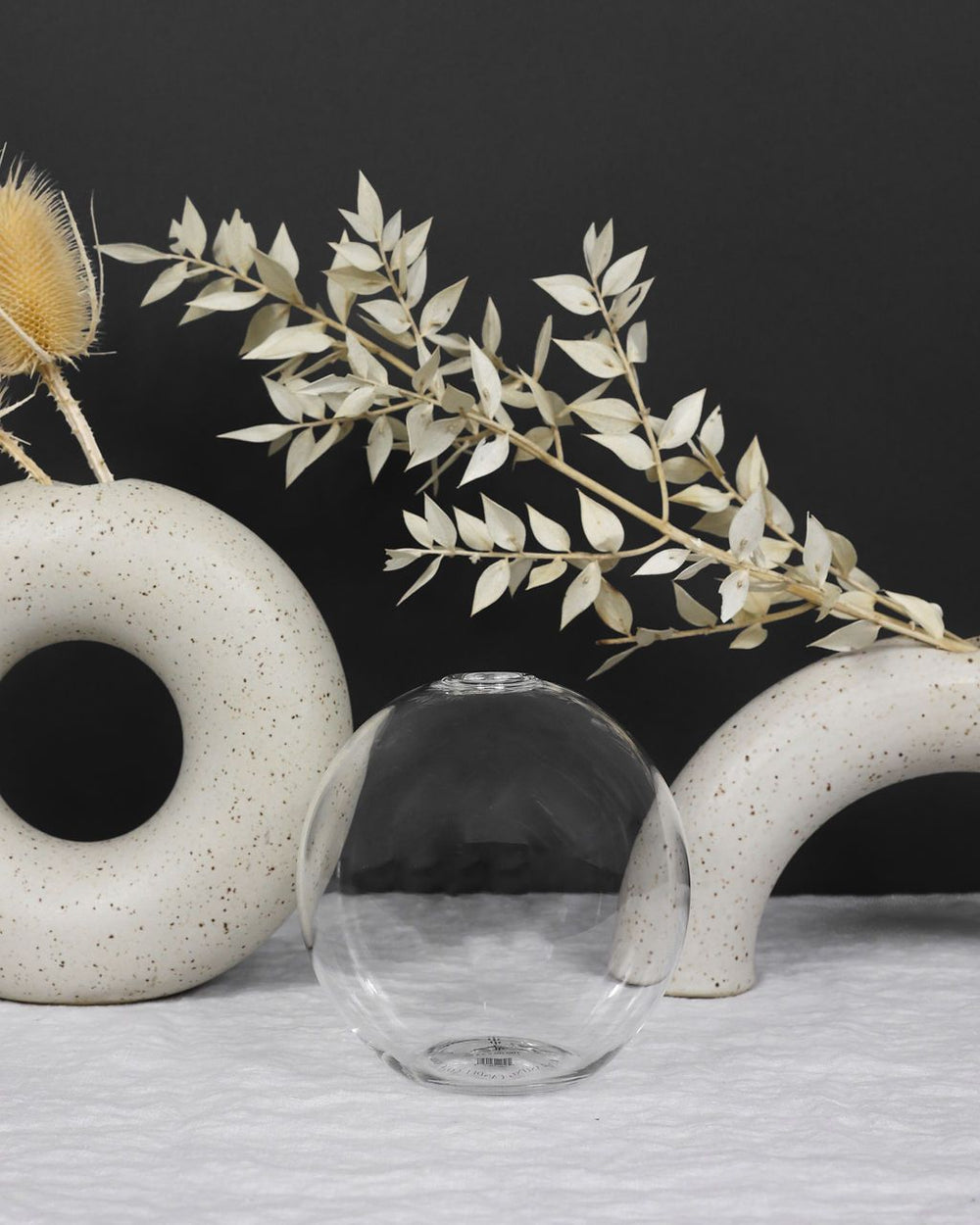 Handblown glass Neva vase with a clear finish and organic curved silhouette.