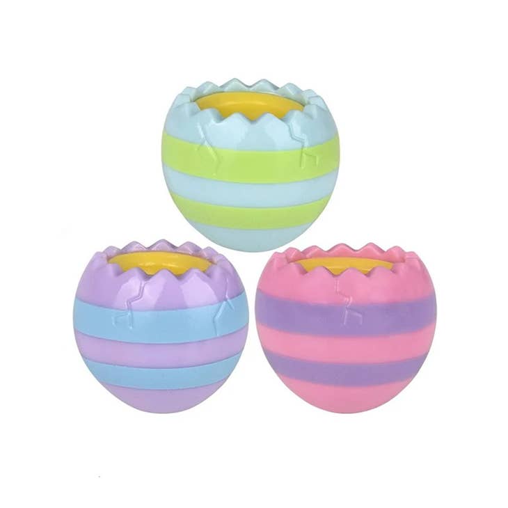 Squeeze Easter chick egg toy with colorful pop-up bird design