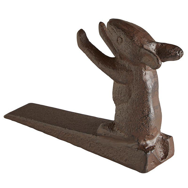 Cast iron rabbit-shaped door stopper in matte black finish.