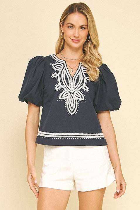 Gail embroidered detail balloon short sleeve V-neck blouse in white cotton with shirring.