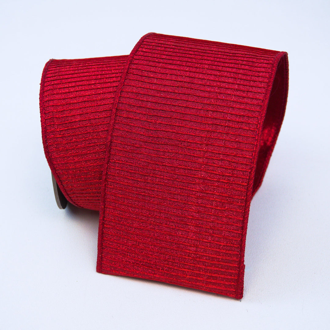 Roll of vibrant red pleated metallic ribbon with a textured, ribbed finish.