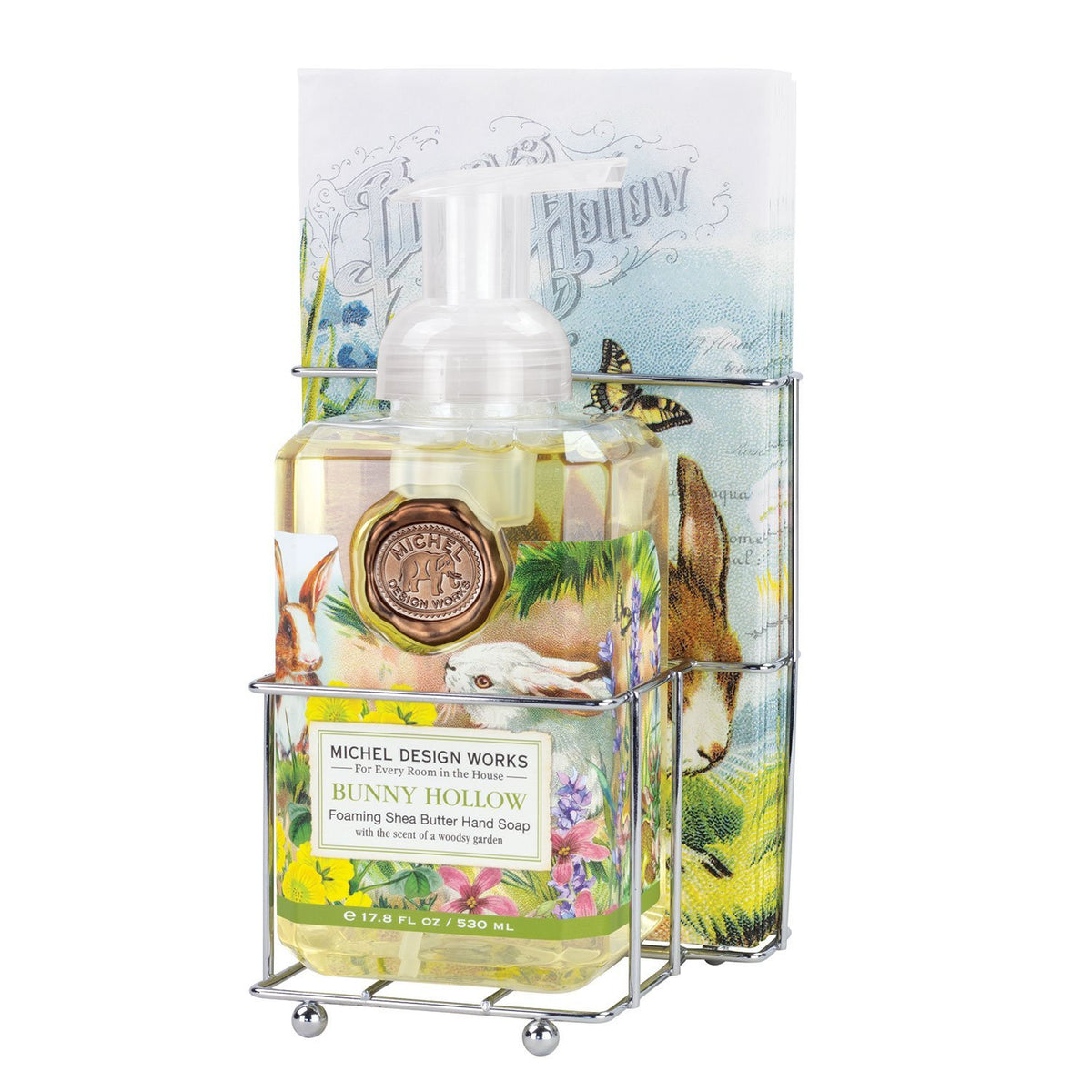 Foaming soap dispenser with matching napkin holder in a compact white countertop set