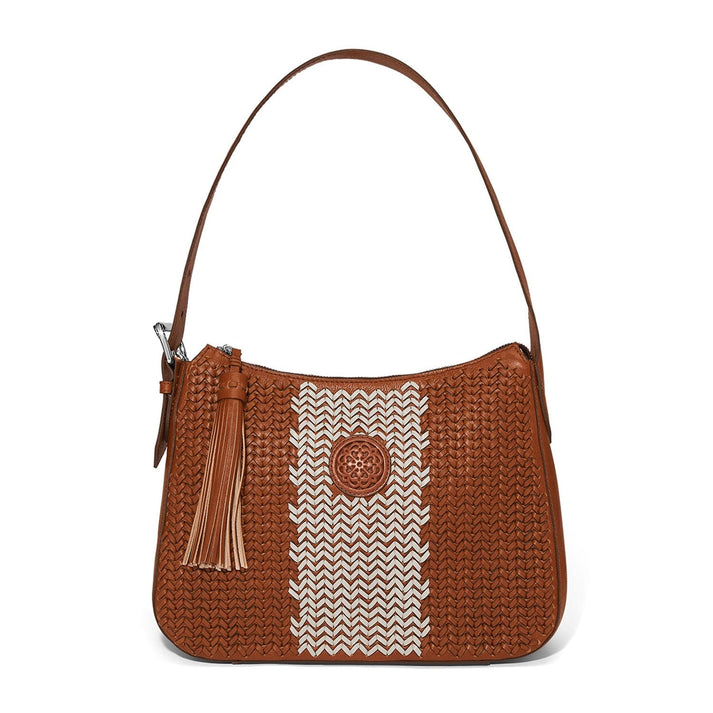 Russet brown woven leather shoulder bag with a white chevron stripe and a decorative tassel.