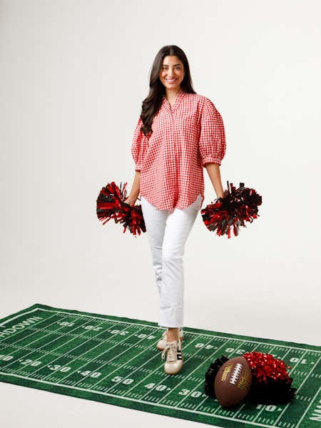 Laura Top in white cotton poplin featuring a ruffled stand collar, covered placket, and pleated sleeves.
