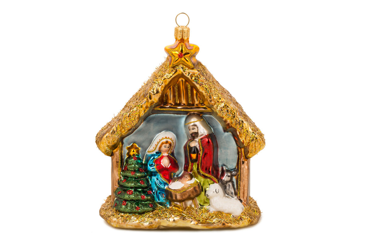 Hand-painted Holy Family ornament with glitter finish in warm tones.